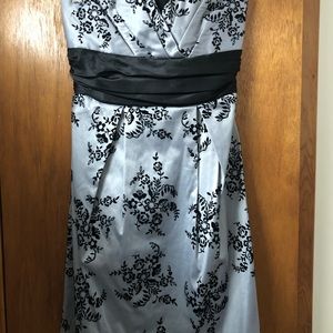 Black and silver cocktail dress with bow